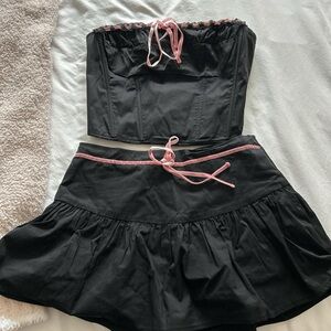 Elegant Black Mini Skirt with Pink Trim